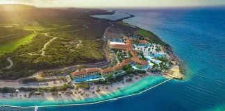 Royal Caribbean ta kumpra mitar Sandals and Beaches